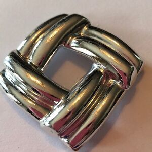 Square silvertone pin. New w/o tag.